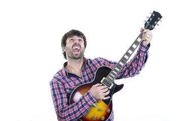 Young crazy man playing guitar