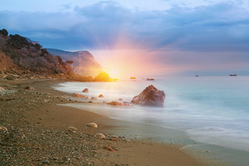 A photo of beach sunset and sea cost