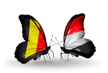 Two butterflies with flags Belgium and Yemen
