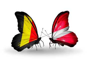 Two butterflies with flags Belgium and Latvia
