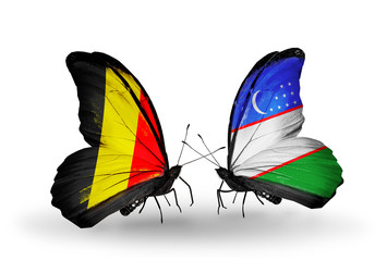 Two butterflies with flags Belgium and Uzbekistan