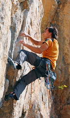 The rock-climber during rock conquest