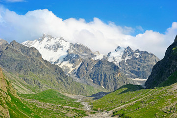 landscape with mountains trees and a river