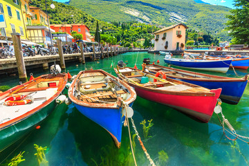 Obraz premium Colorful boats on the lake,Garda lake,Torbole,Italy,Europe