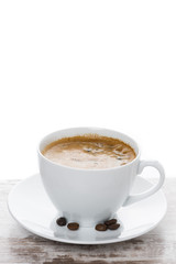 cup of espresso on a white table and space for text, vertical
