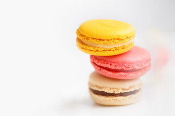 Colorful French pastry on a white background.