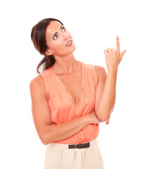 Pretty woman in elegant shirt pointing up