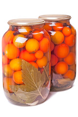 Canned tomatoes in a glass jar