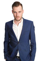 Focused businessman in blue suit