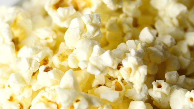 Macro footage of popcorn In Rotation