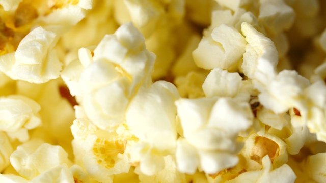 Macro footage of popcorn In Rotation