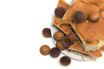 Cake rolls and round candy - baking. Photo.