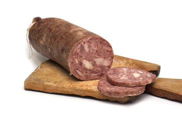 Sausage meat on a cutting board. Photo.