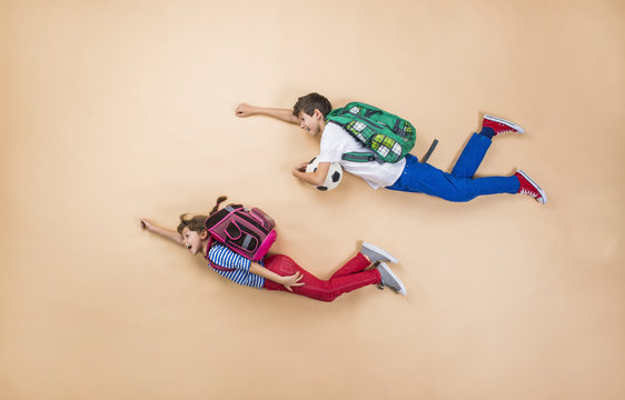 Children Running To School