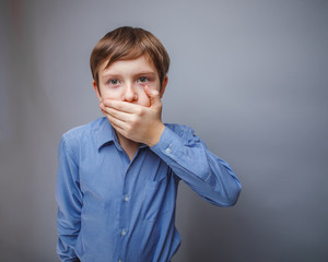 teenager boy of 10 years European appearance closed mouth wit
