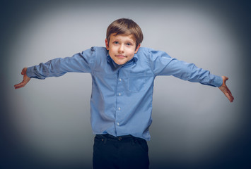 teenager boy 10 years of European appearance spread his hands