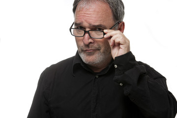 Mature man with glasses looking at camera