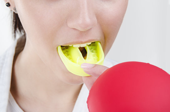 Woman with mouthguard