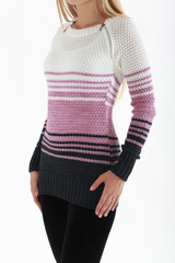Young slim blond woman's torso in tight striped sweater isolated