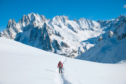 Extreme Sport. Lone hikers in winter mountains