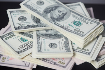 money on the table in a chaotic manner