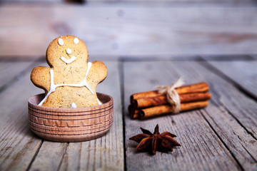 Christmas homemade gingerbread cookies on wooden table