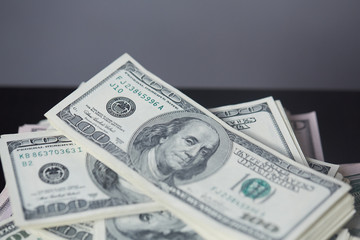 money on the table in a chaotic manner