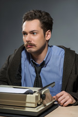 Inspired young author typing