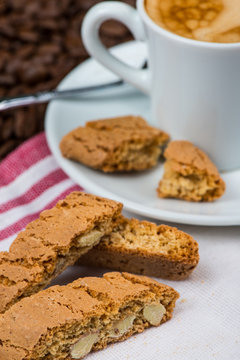 almond biscuits with cup of coffee