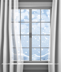 Winter snow falling outside the paned window of a house
