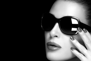 Fashion Model Woman in Black Oversized Sunglasses. Monochrome
