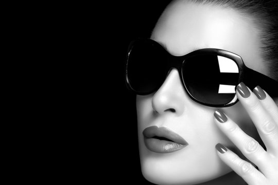 Fashion Model Woman in Black Oversized Sunglasses. Monochrome