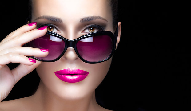 Fashion Model Woman in Pink Sunglasses, Makeup and Manicure