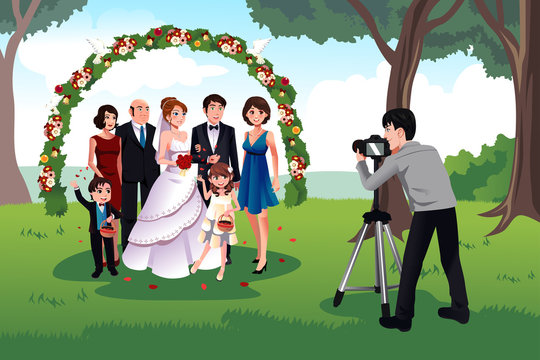 Man photographing a family in a wedding