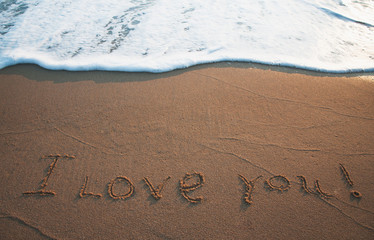 I Love You Written in the Sand on Valentine's Day .