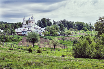 Fototapeta na wymiar Slanic monastery in Arges county on a cloudy day