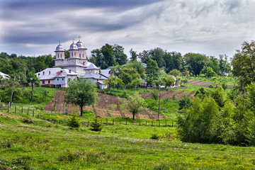 Fototapeta na wymiar Slanic monastery in Arges county on a cloudy day