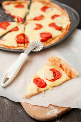 Italian pizza with mozzarella cheese and tomatoes, Margarita