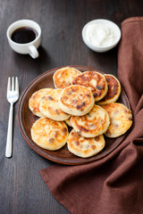 Delicious homemade cheese pancakes with coffee