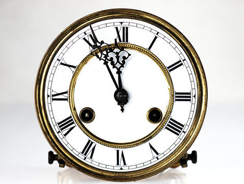 Old clock with roman numerals.