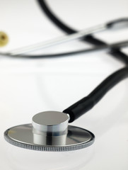 Medical stethoscope on a white background.