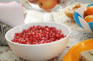 peeled pomegranate in plate