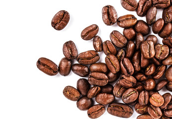 Brown coffee beans isolated on white background macro. Roasted C