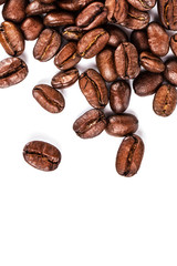 Brown coffee beans isolated on white background macro. Roasted C