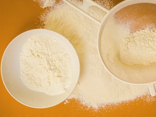 Preparation for baking, ingredients flour sifting.