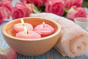 Close-up of candles and flowers