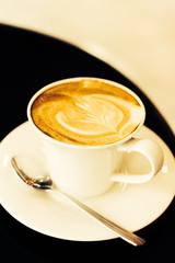 Latte coffee cup on table