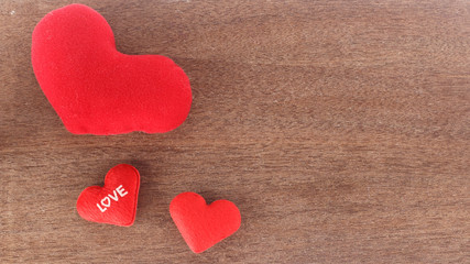 Fototapeta premium valentines day background- top view of red heart on wood