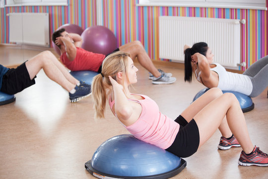 Doing crunches on the bosu