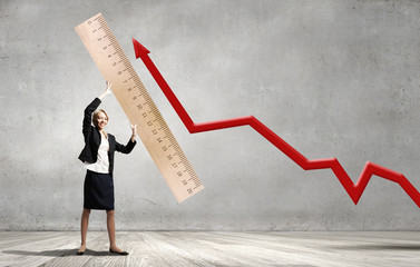 Woman with huge ruler